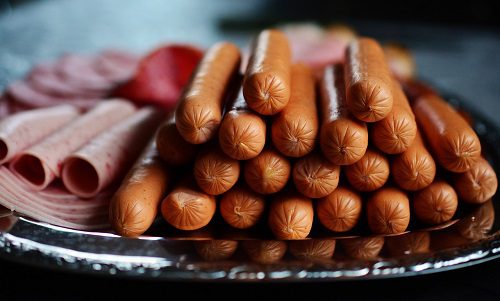 Are Hot Dogs Precooked: Unraveling the Truth Behind America’s Favorite Sausage