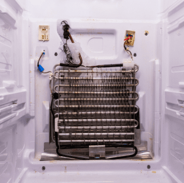 Partially Frosted Refrigerator Evaporator Coils