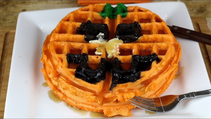 Halloween Breakfast Pumpkin Spice Waffles with Whipped Cream Webs
